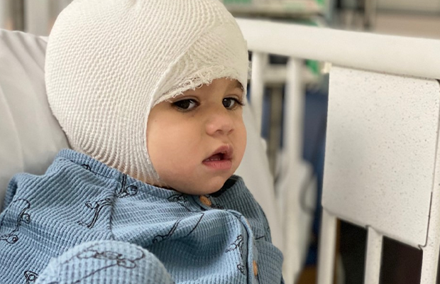 bandaged child in hospital